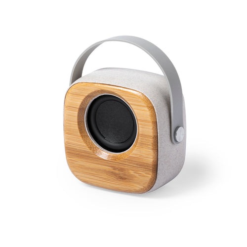 Haut-parleur / Enceinte Bluetooth en combinaison de morceaux de bambou taillés dans la nature et de boîtier en paille de blé, afin d'encourager l'utilisation de matières premières naturelles et de réduire les...