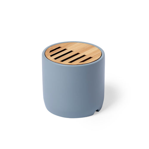 Haut-parleur / Enceinte Bluetooth en combinaison de morceaux de bambou taillés naturels et de ciment calcaire, un conglomérat formé par la combinaison de matériaux naturels, principalement du calcaire moulu et de...
